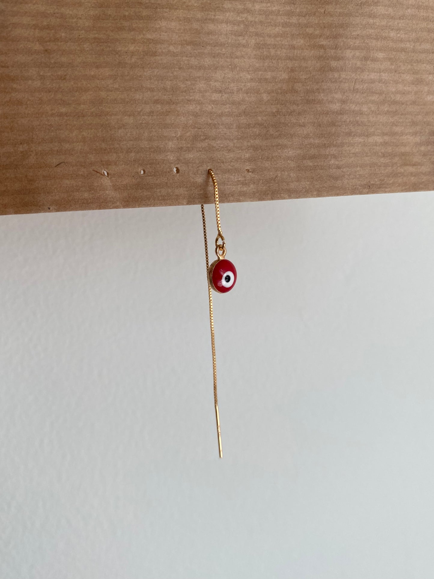 Red eye earring